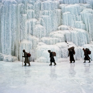 The cold during winter has frozen this waterfall falling into the river in Zanskar (Indian Himalaya)